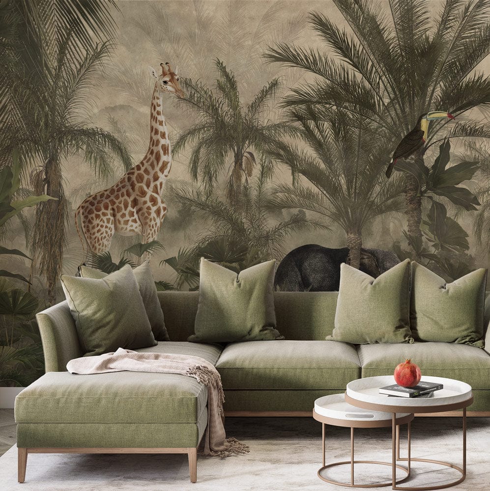 Exotic Jungle Mural Wallpaper in Earthy Tones, green sofa, round tables, living room setting.