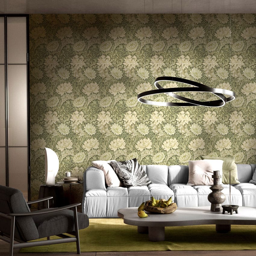 Elegant sage green floral wallpaper in vintage-style living room with grey sofa and modern chandelier.