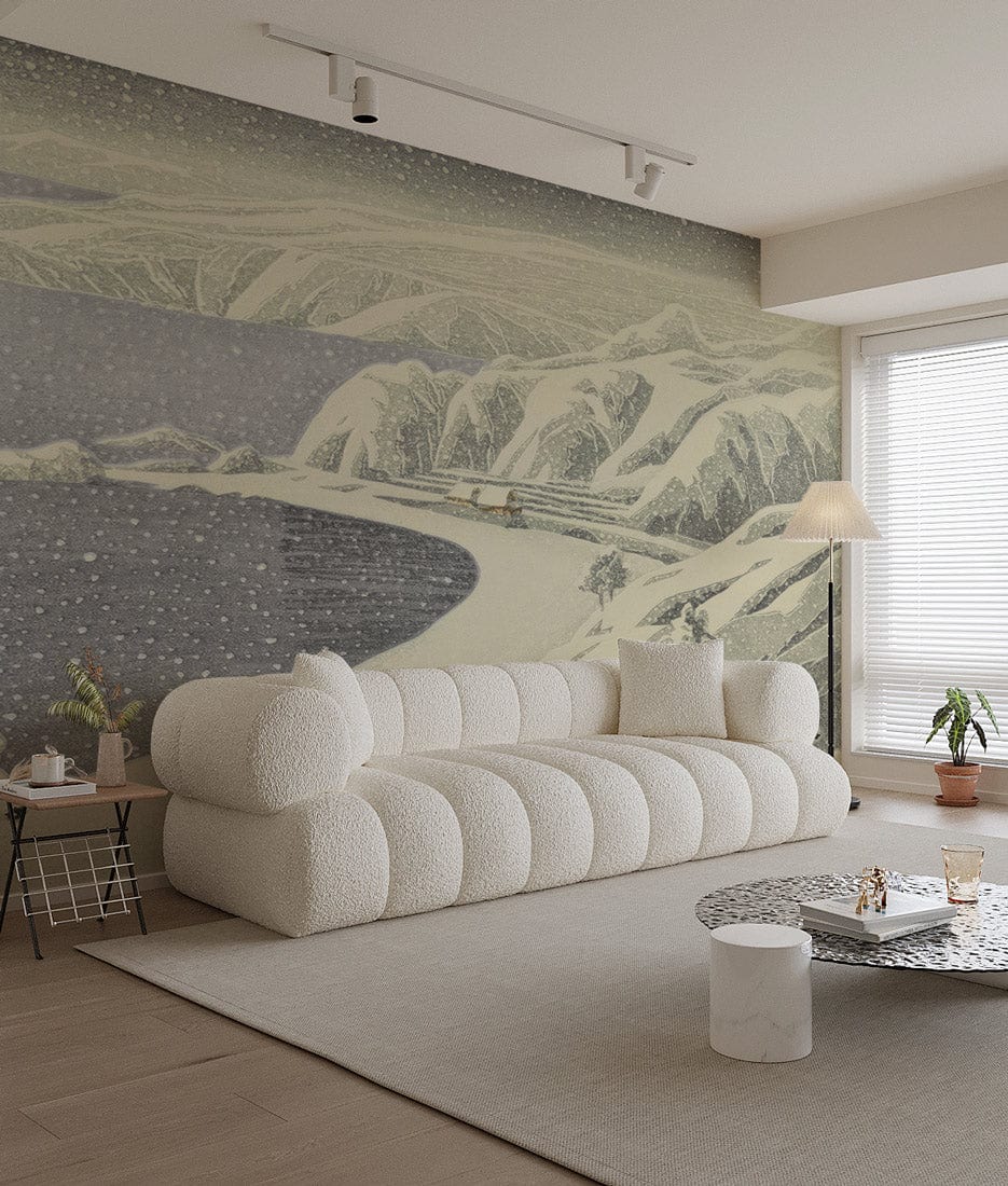 Elegant grey Japanese mural wallpaper, serene winter coastline; textured white modern sofa, neutral flooring.