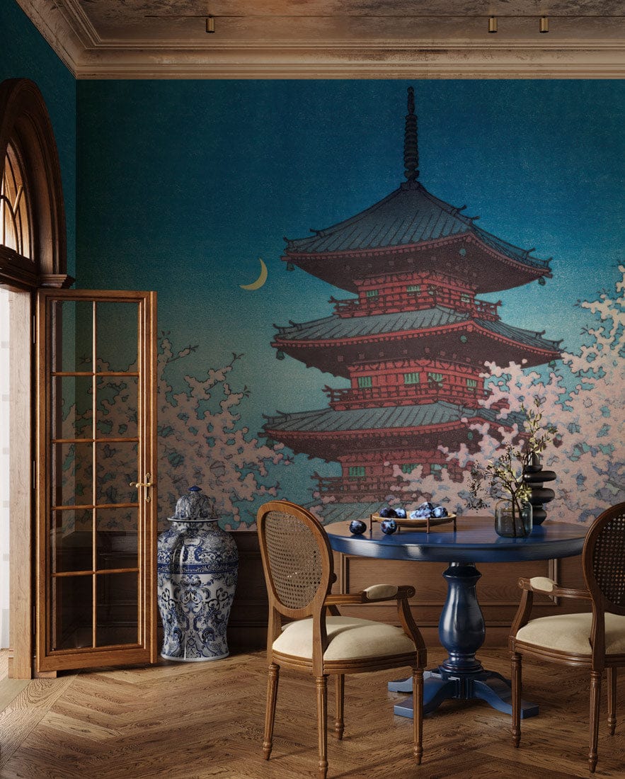 Serene Japanese Pagoda Mural Wallpaper in dining room with blue table, wooden chairs, herringbone floor.