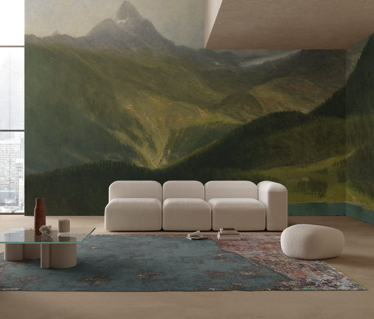 Serene Mountain Landscape wallpaper in a living room with white modular sofa, glass coffee table, and rug.