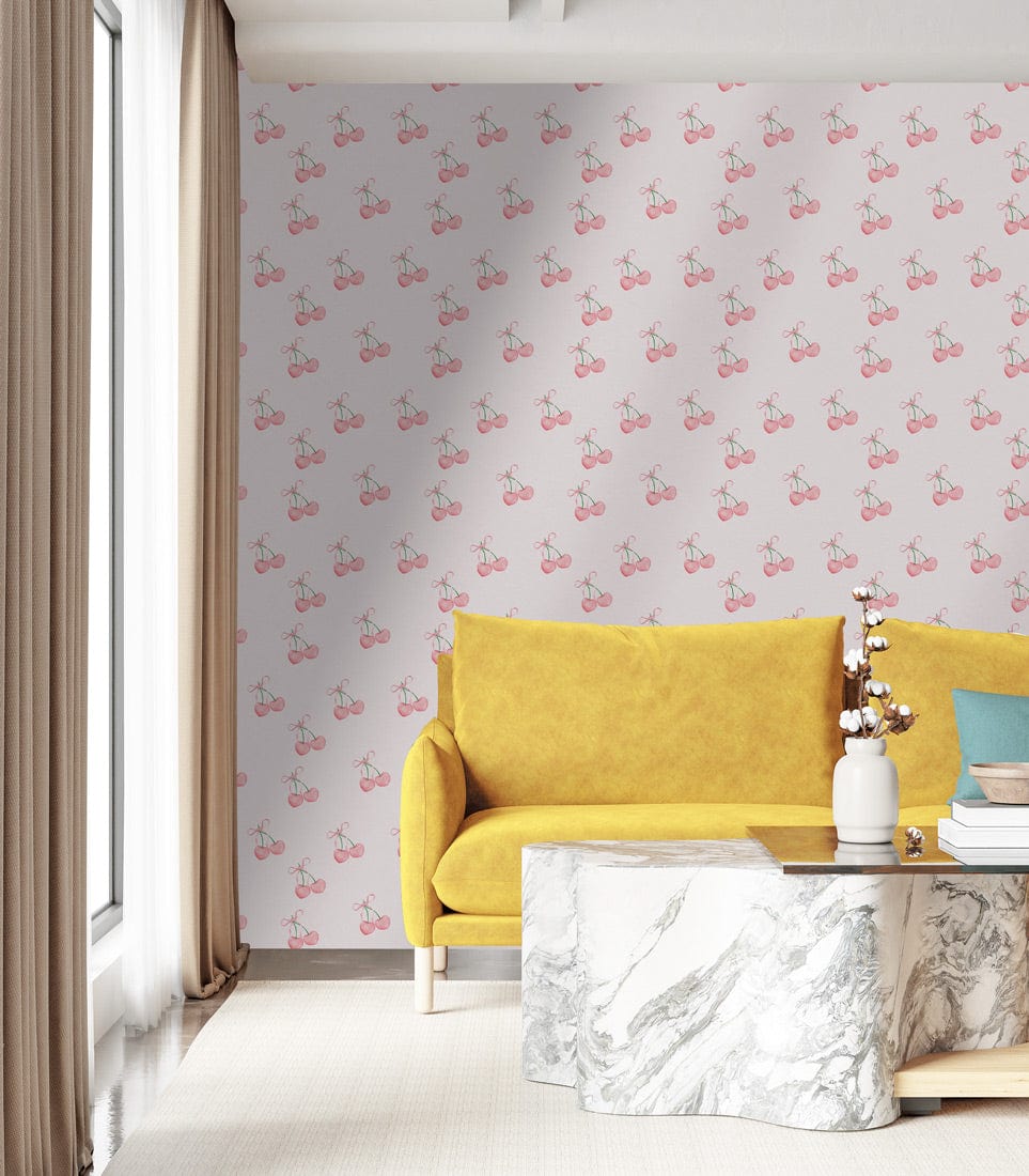 Vintage Pink Cherry Pattern Wallpaper with yellow retro sofa and marble coffee table in living room.