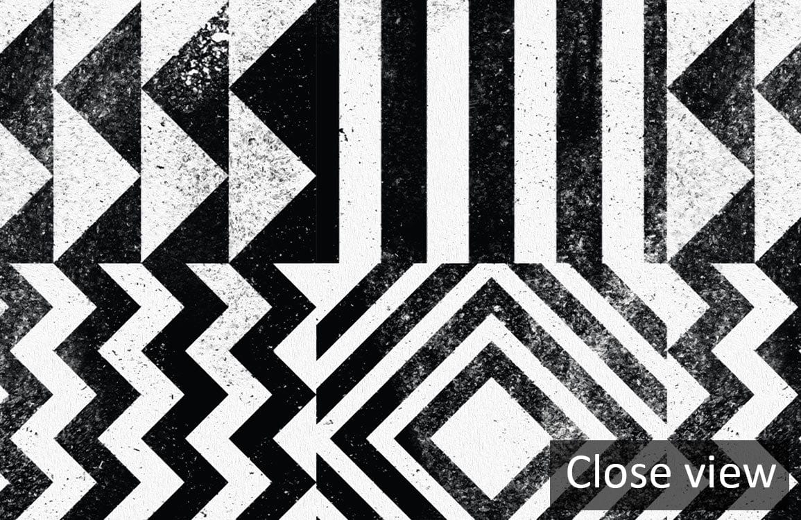 Close-up of bold monochrome geometric wallpaper, modern black and white design, artistic pattern.