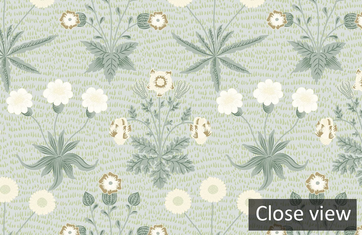 Close view of vintage floral wallpaper in soft green with cream tones, elegant botanical design.