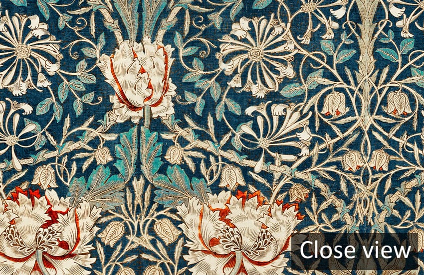 Close view of elegant vintage floral patterned wallpaper in teal and earthy tones, intricate design.