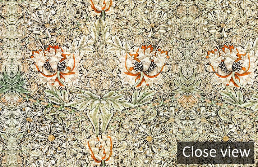 Close-up of Vintage Floral Elegance Victorian-style wallpaper in green and gold shades.