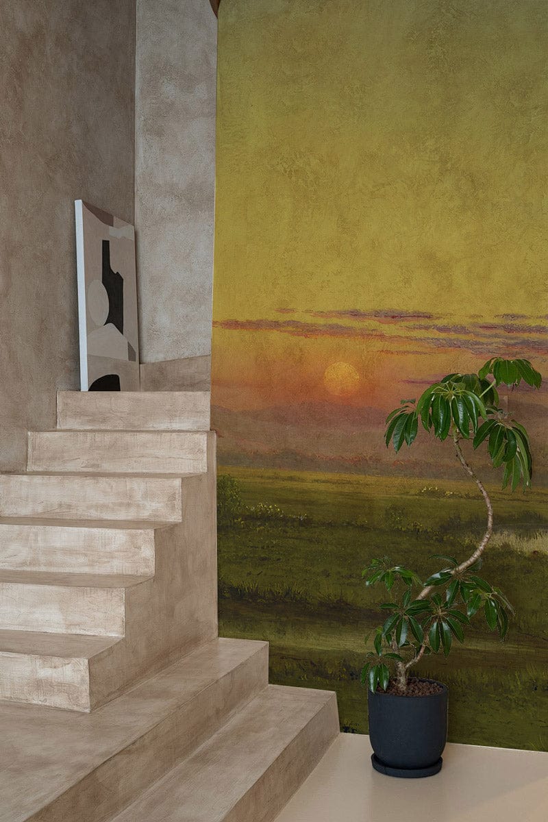 Sunset Serenity mural in green and amber hues with modern staircase, complementing plant decor.