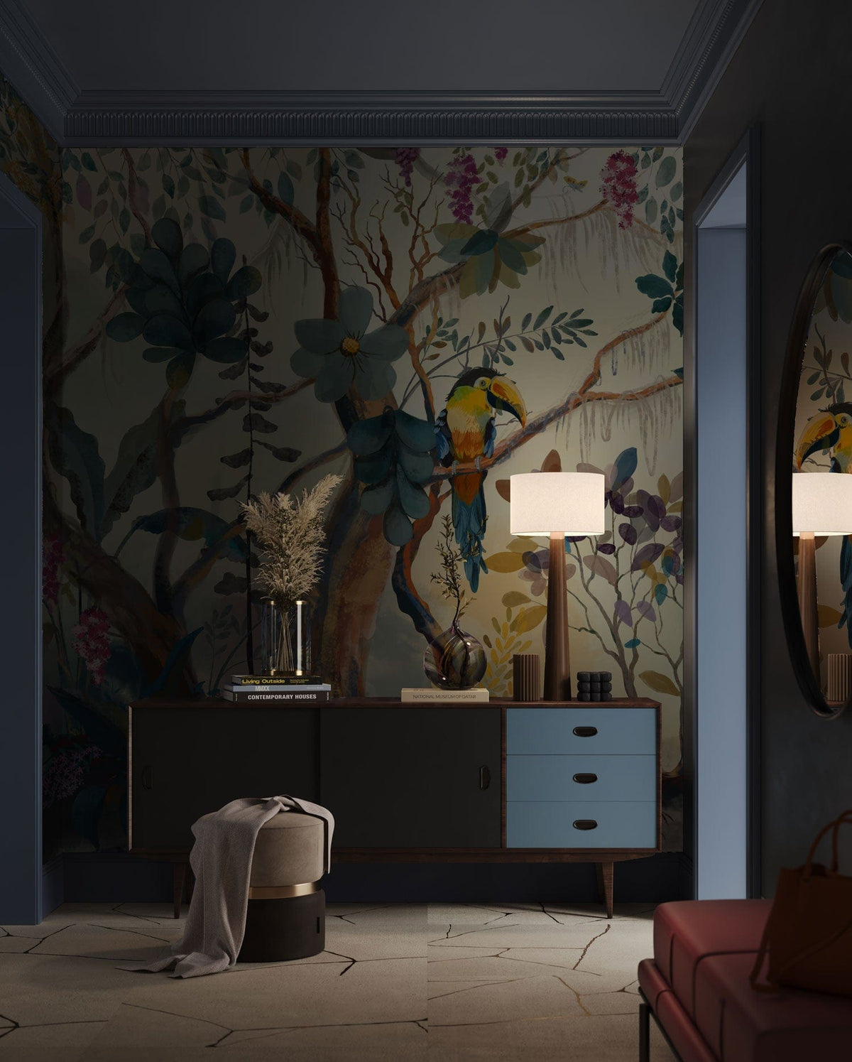 Multicoloured jungle mural wallpaper with exotic birds, blue sideboard, modern grey room, light flooring.