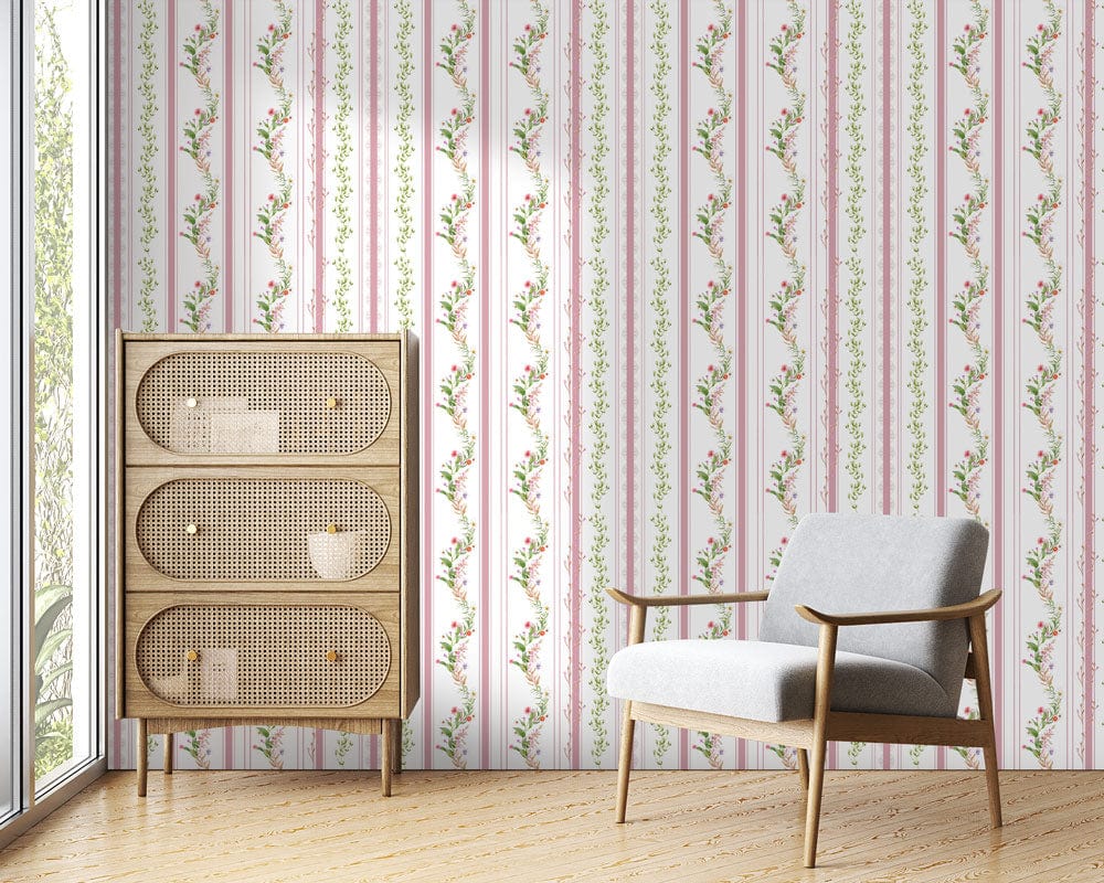 Elegant floral wallpaper in vintage interior with rattan cabinet, grey chair, wooden flooring, bright room.