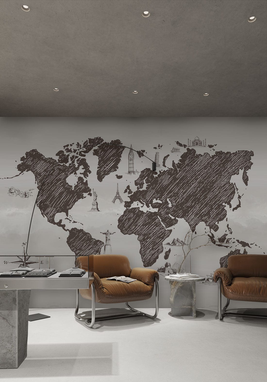 Vintage Sketch World Map Mural Wallpaper in charcoal grey; brown leather sofas; modern living room.
