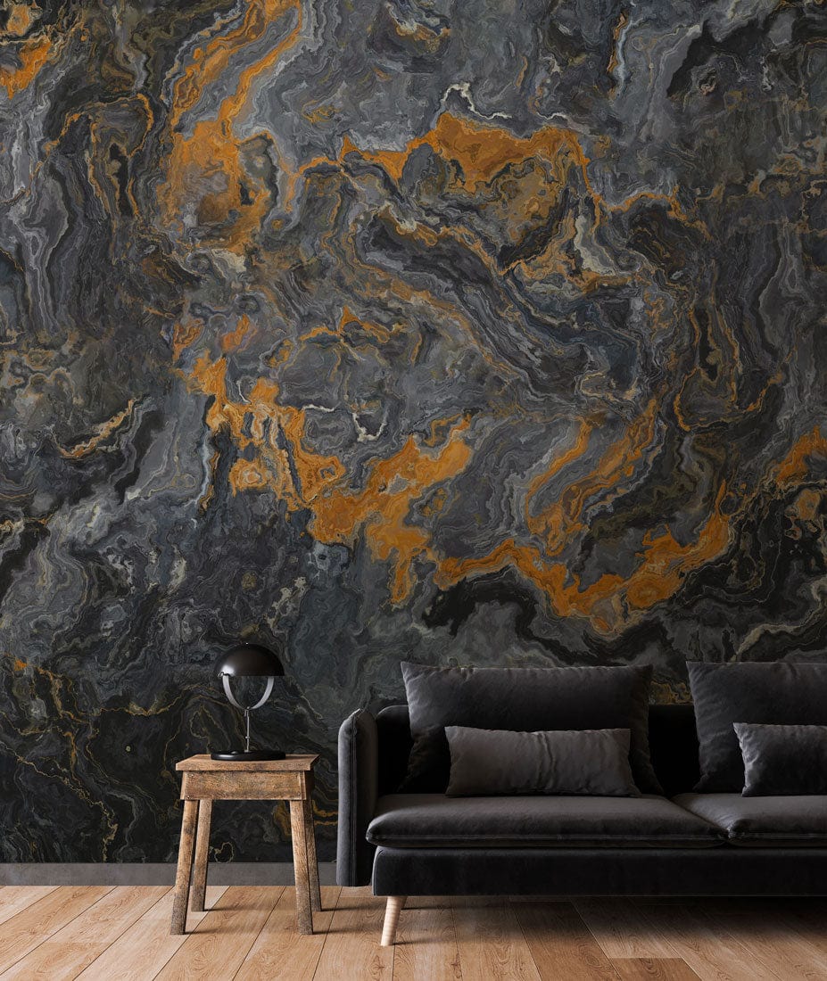 Luxury Charcoal and Gold Marble Effect Wallpaper in modern living room with black velvet sofa, wooden flooring.