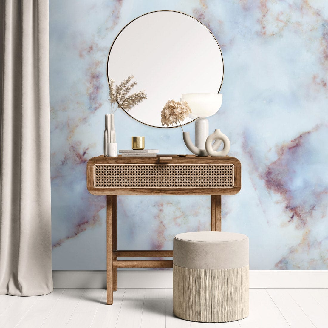 Abstract watercolour marble wallpaper, wooden console, round mirror, beige curtain, pouffe, light wooden floor.