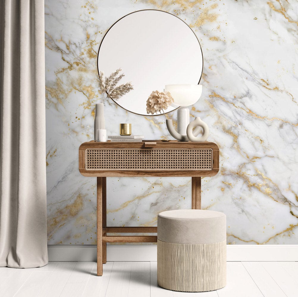 Luxurious white and gold marble effect mural with elegant console, round mirror, and cream curtain.