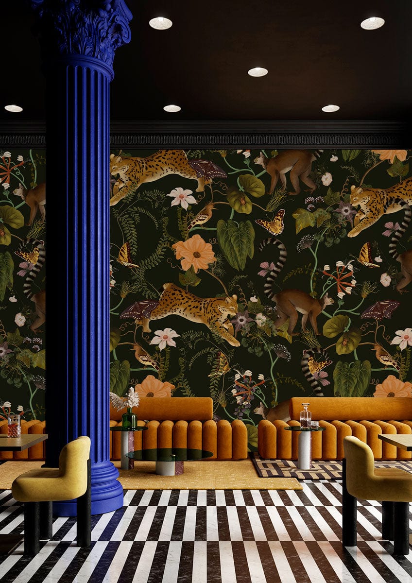 Exotic Jungle Mural Wallpaper with flora, stripe flooring, ochre sofas, and bold column in lounge.