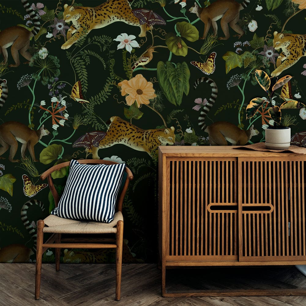Exotic Jungle Wildlife Mural Wallpaper with floral motifs, wooden sideboard, chair, hardwood flooring.