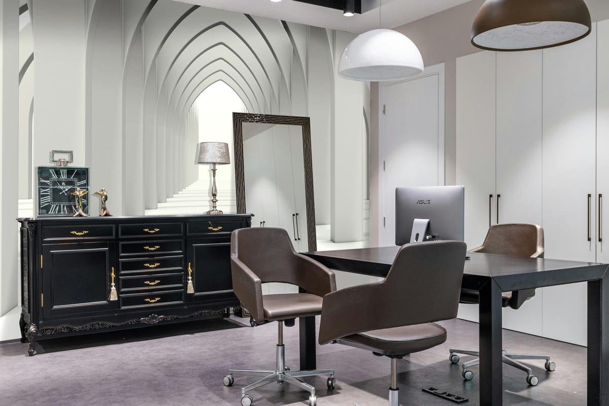 Elegant monochrome Gothic archway mural wallpaper enhancing modern office with black desk and chairs.