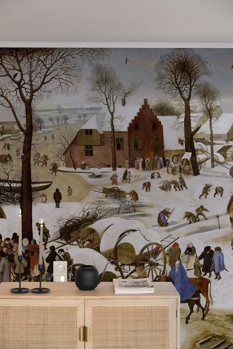 Vintage winter scene mural wallpaper, rustic village charm, soft colours, wicker cabinet, neutral room.