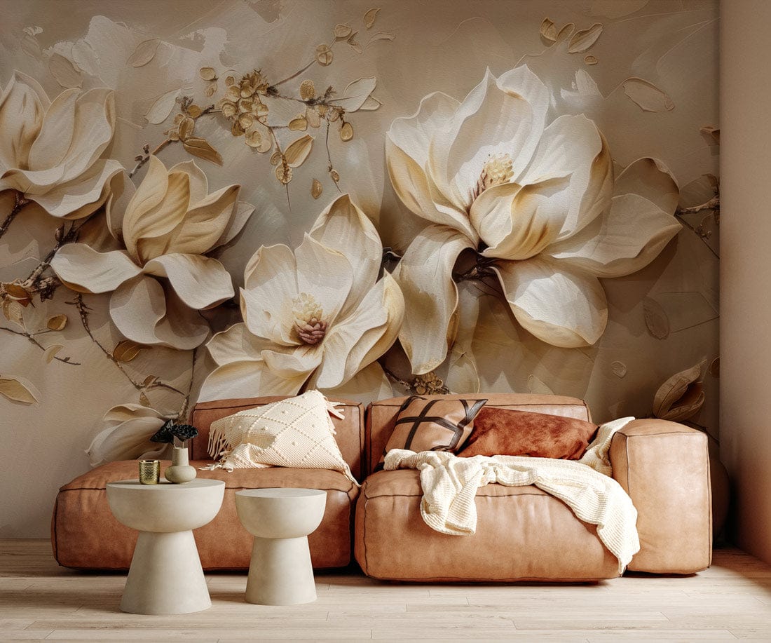 Elegant beige floral mural wallpaper with blossoms behind tan sofa, minimal stools, light wood flooring.