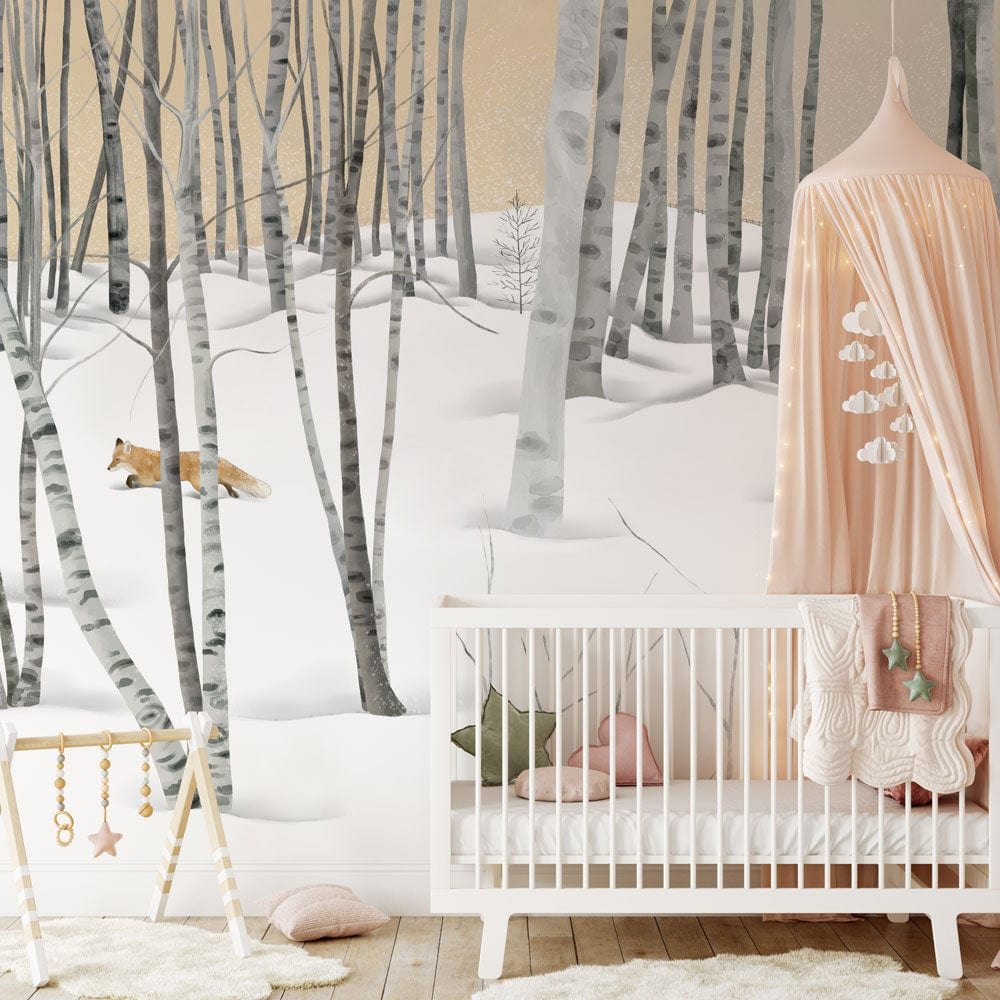 Winter Wonderland Birch Forest Mural with fox, pink canopy, white crib, light wooden nursery flooring.