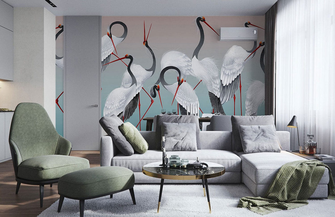 Elegant crane mural wallpaper in modern living room with grey sofa, green chairs, wood flooring.