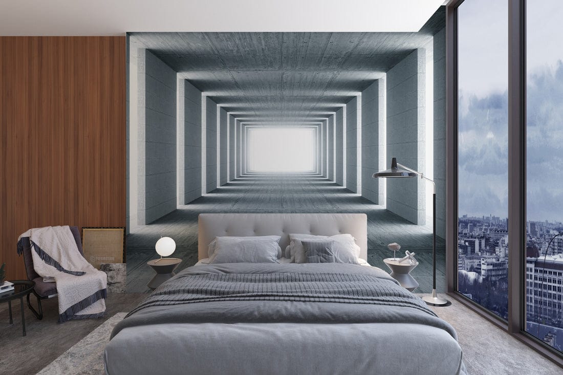 Abstract grey tunnel mural wallpaper in modern bedroom with grey bedding, wooden accent wall, and lamp.