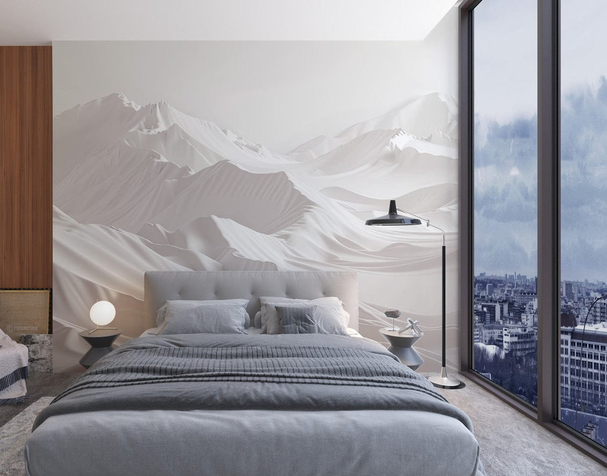 Serene White Mountain Range mural wallpaper in minimalist bedroom with taupe bed, grey flooring, large windows.