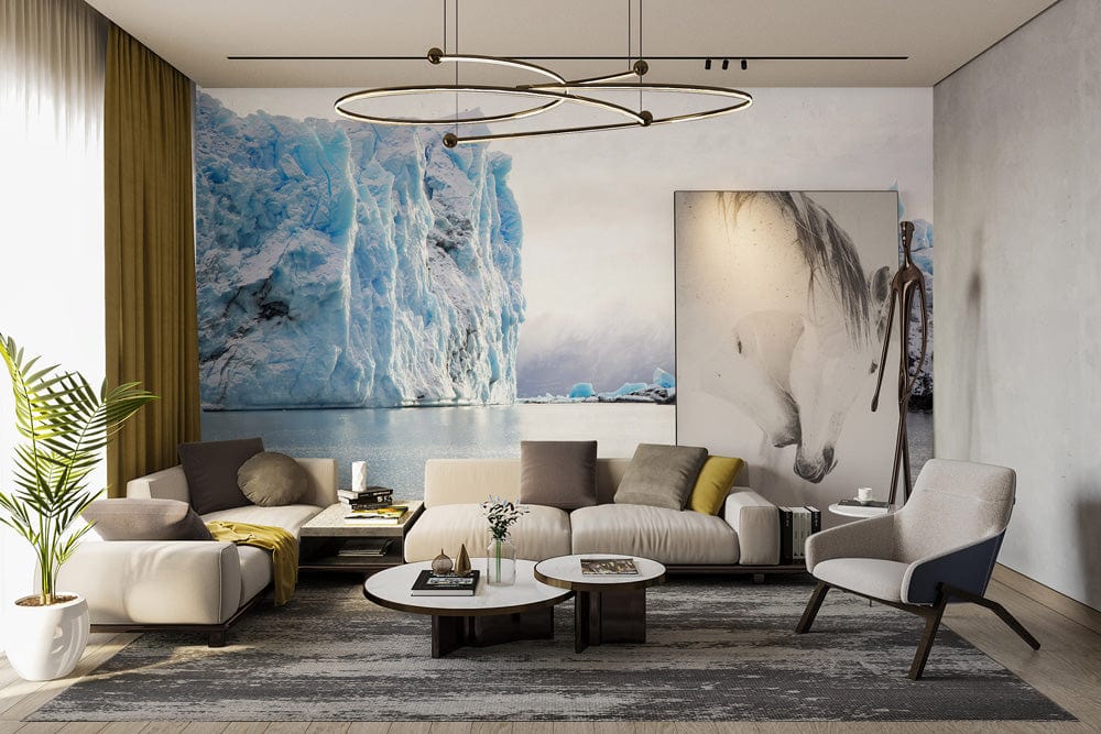Luxurious living room with glacier mural wallpaper, beige sectional sofa, grey chairs, modern lighting fixture.