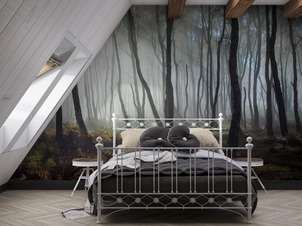 Bedroom with Misty Enchanted Forest Mural Wallpaper, metal bed frame, wooden ceiling beams, herringbone floor.