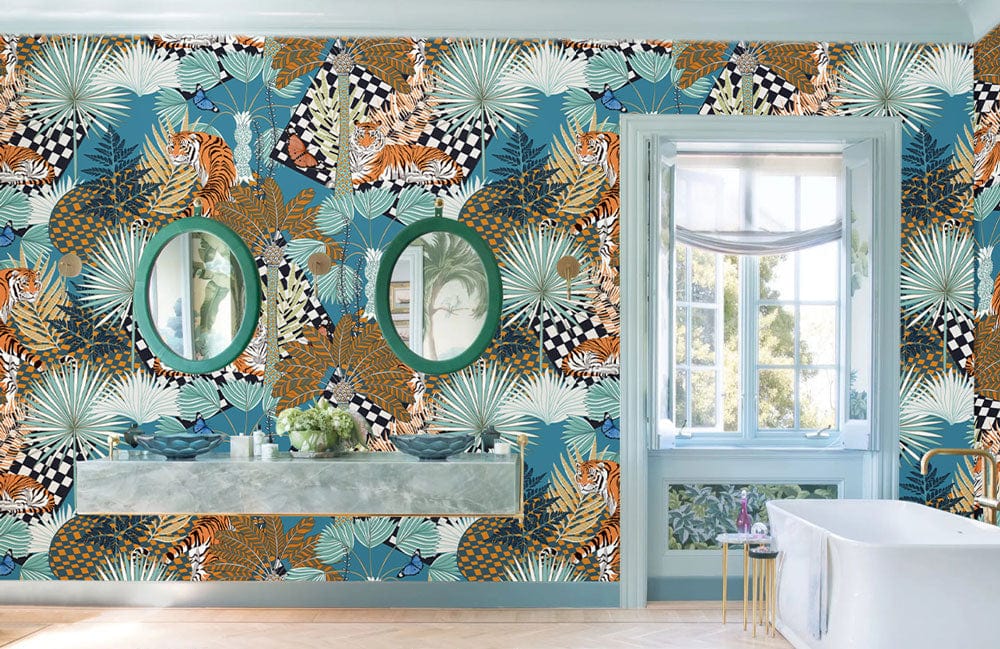 Exotic Jungle Safari mural wallpaper with tigers, blue and gold bathroom, marble vanity, round mirrors.