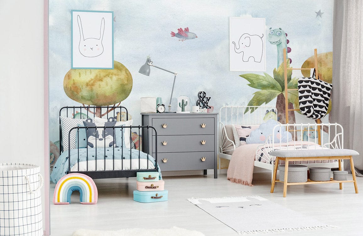 Whimsical Dinosaurs mural wallpaper in children's bedroom with grey dresser, twin beds, colourful decor.