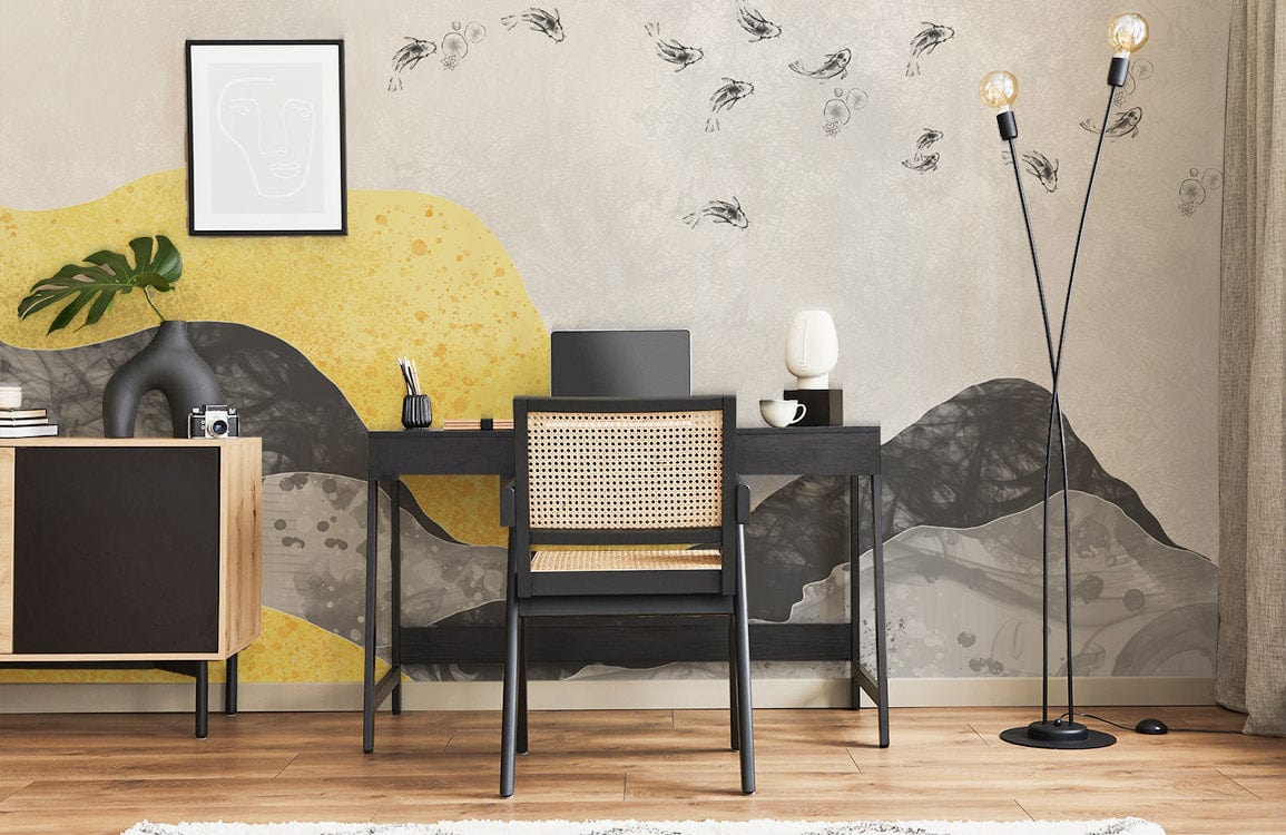 Abstract mountain landscape mural in yellow and grey, home office setting with wooden flooring, black desk.