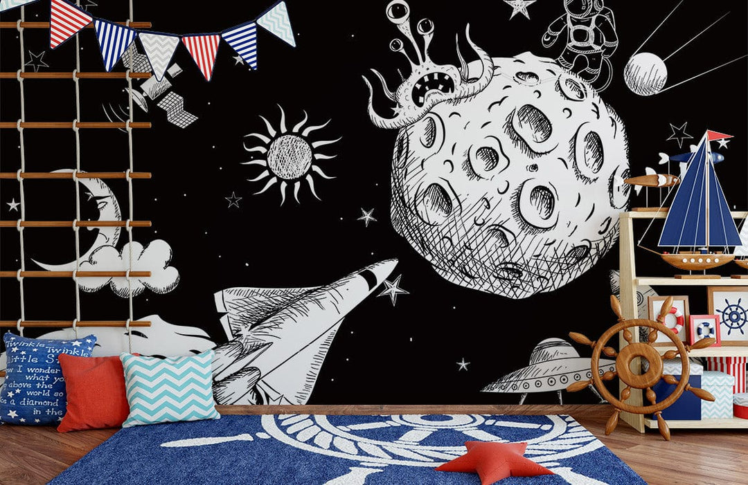 Black and White Cosmic Adventure Kids' Space Mural Wallpaper with navy rug, nautical-themed decor, wooden floor.