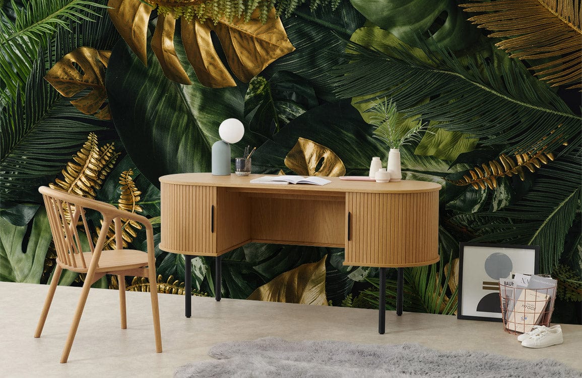 Luxurious golden leaf wallpaper, wooden desk and chair, grey rug on light tiled floor, modern decor.