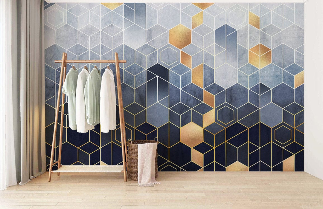 Geometric Blue and Gold Mural Wallpaper, wooden flooring, clothing rack, modern room decor, natural light.