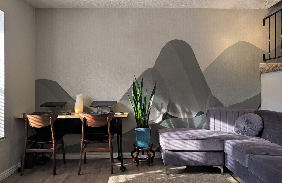 Modern living room with Tranquil Grey Mountain Mural; grey sofa, wooden flooring, minimalist design.