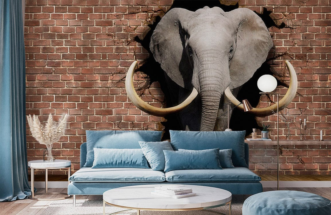 Elephant mural wallpaper in rustic room with blue sofa, brick wall, modern lamp, and round table.