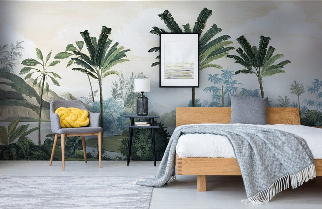 Tropical vintage palm mural wallpaper, earthy tones, bedroom, wooden bed, grey throw blanket, armchair.