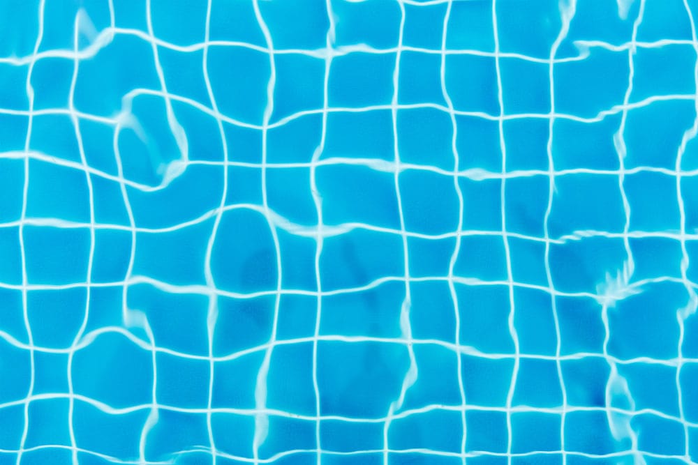 Aqua Blue Rippling Water Grid Pattern Wallpaper for Stylish Interiors