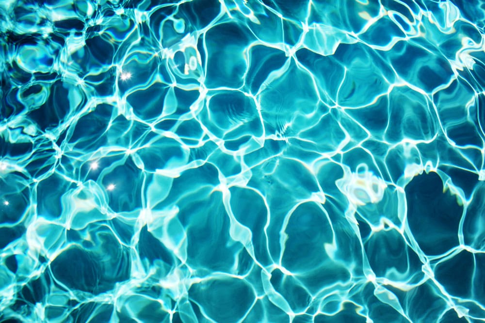 Turquoise Ripple Effect Aquatic Theme Wallpaper for Serene Interior Spaces