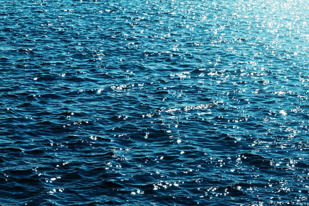 Tranquil Ocean Blue Ripple Pattern Wallpaper for Serene Interior Spaces