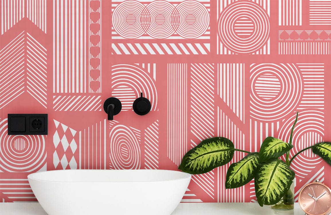 Geometric Coral Pink Retro Abstract Pattern Wallpaper in bathroom with white basin and green plant.