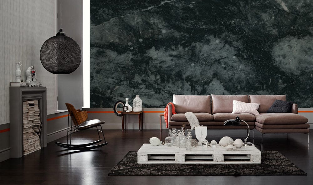 Elegant dark marble effect wallpaper in modern living room with grey sofa and textured charcoal stone.
