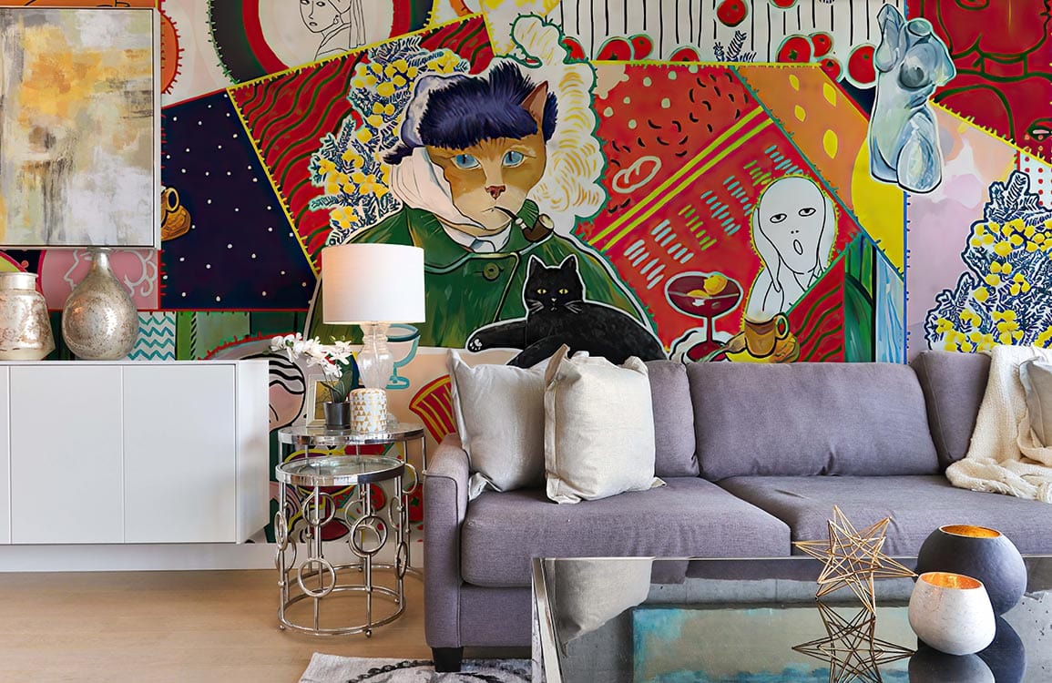 Eclectic multicolour cat mural wallpaper in modern living room with grey sofa and glass coffee table.