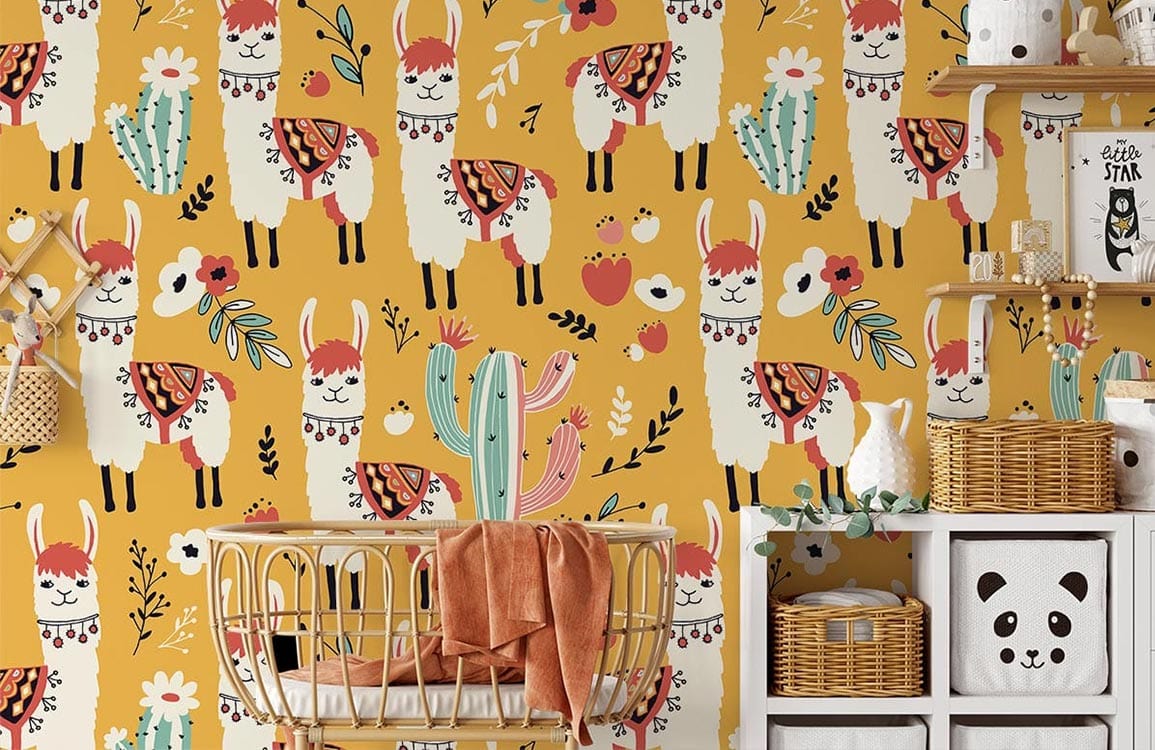 Playful llama safari wallpaper in vibrant orange nursery with boho chic decor and wooden crib.