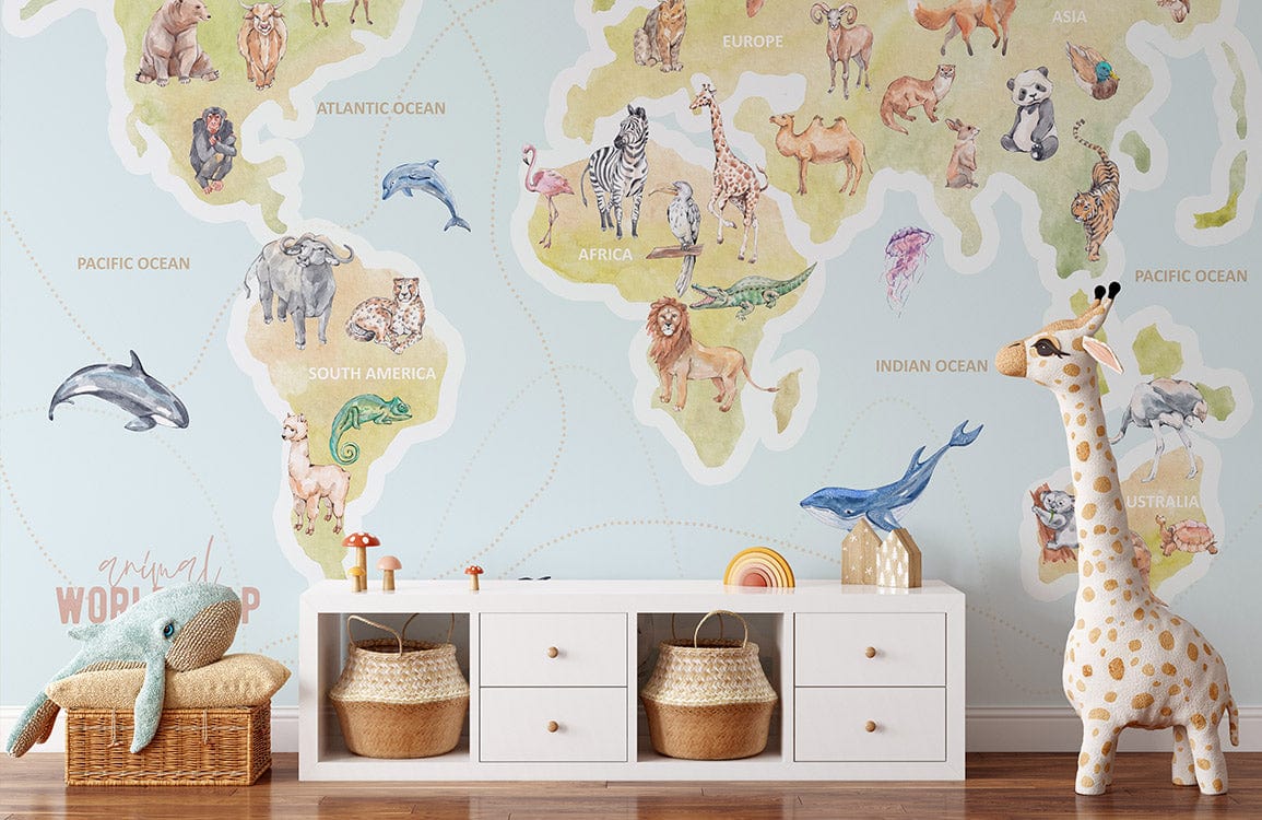 Children's Animal World Map Mural Wallpaper, pastel walls, white storage unit, wooden floor, playroom decor.