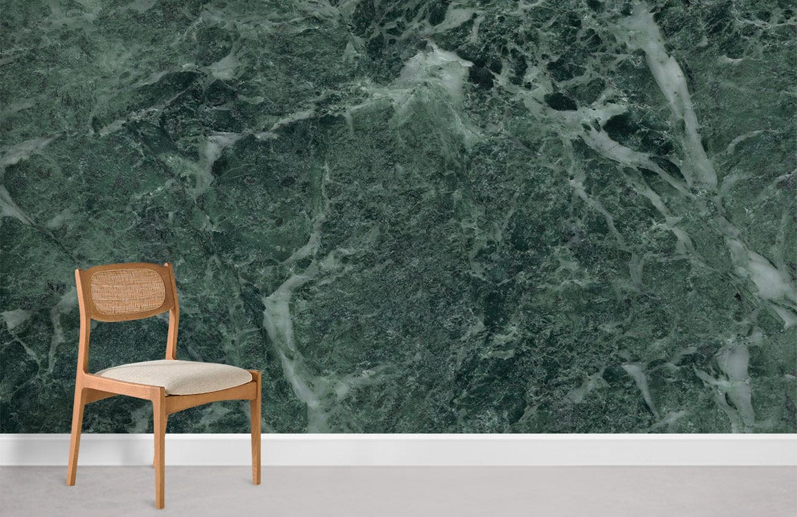 Luxurious green marble effect wallpaper with elegant stone texture, wooden chair, and neutral flooring.