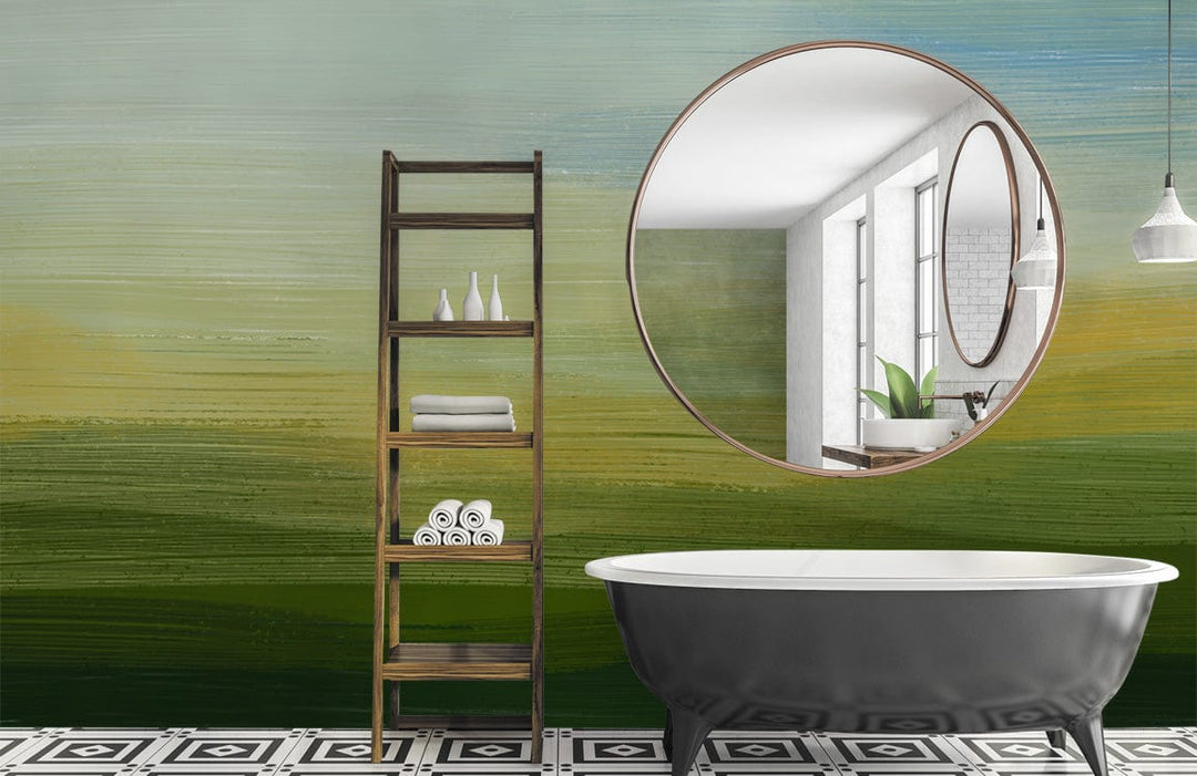 Serene gradient mural wallpaper with circular mirror, freestanding bathtub, geometric floor tiles in stylish bathroom.