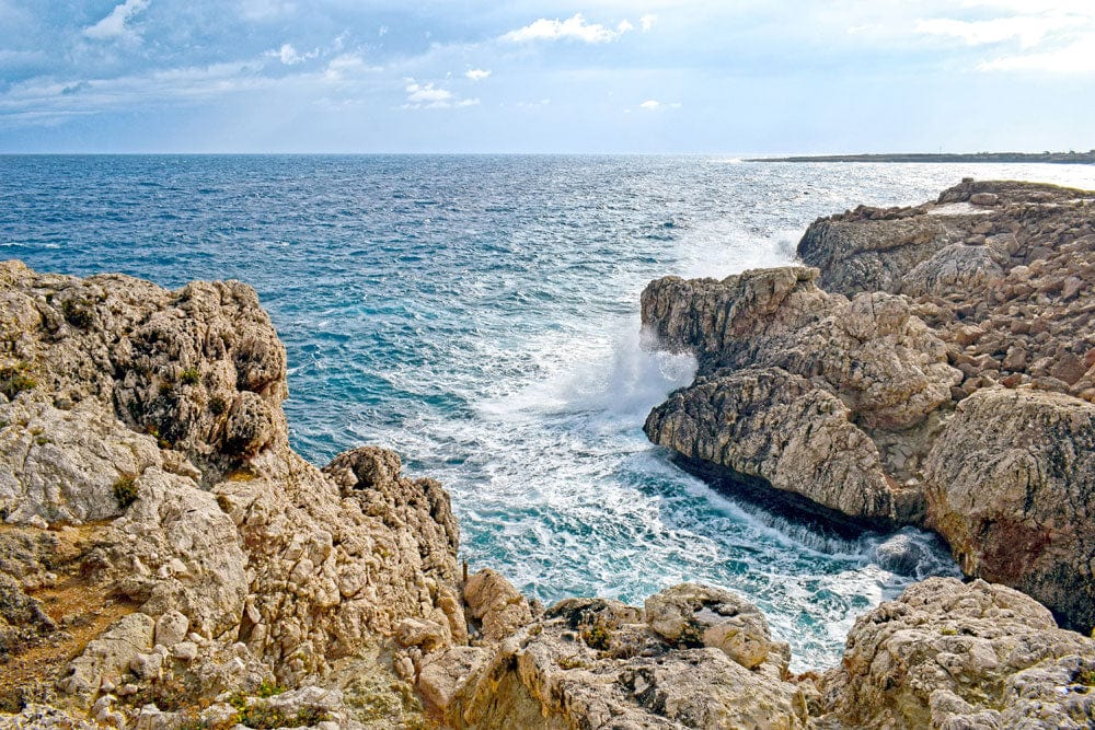 Coastal Cliff Serenity Mural Wallpaper - Natural Sea and Rock Landscape
