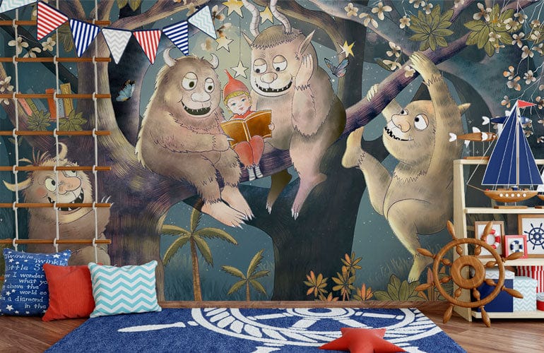 Child's room with dark-tone mural featuring whimsical forest creatures reading by forest wallpaper.