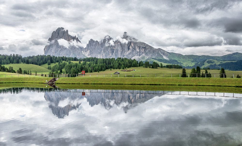 Serene Mountain Reflection Scenic Mural Wallpaper in Calming Greens and Greys